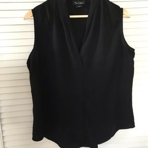 Black sleeveless blouse with unusual shawl collar